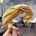 Wide-sided cross-knotted headband