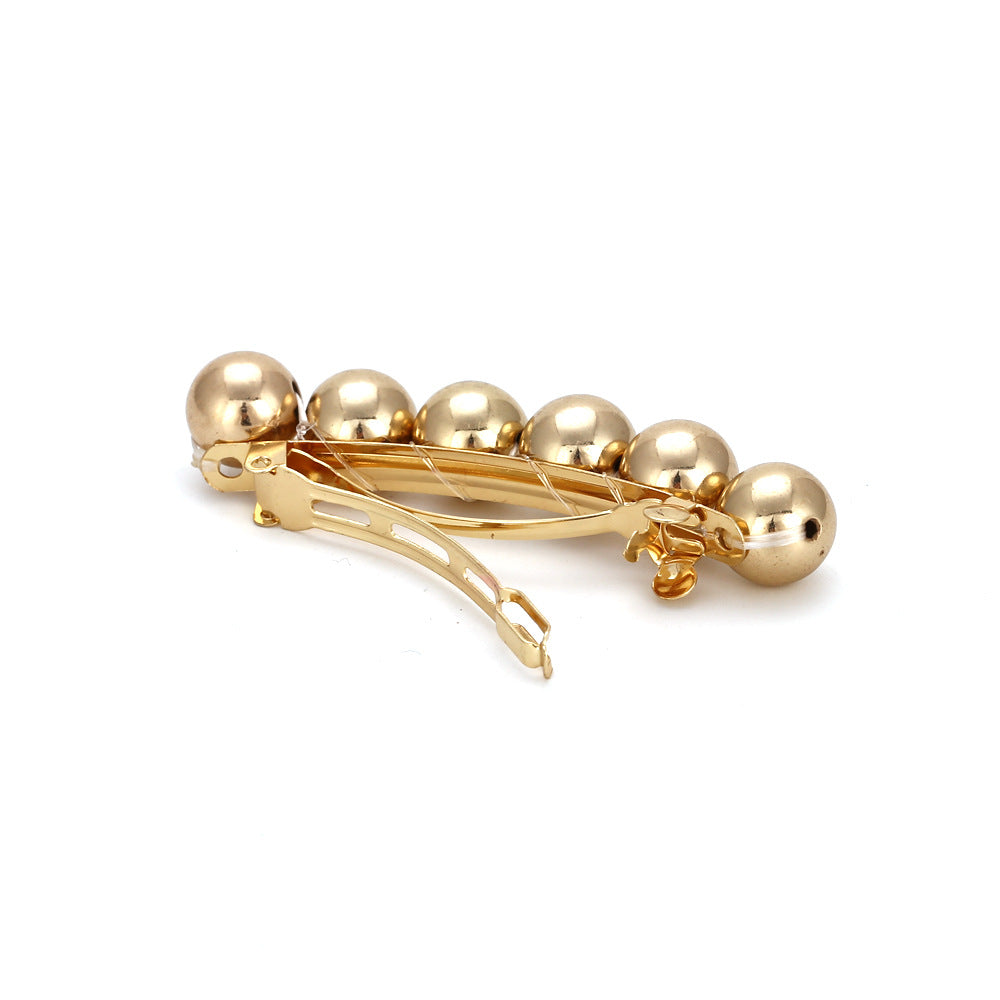 Geometric ball hairpin