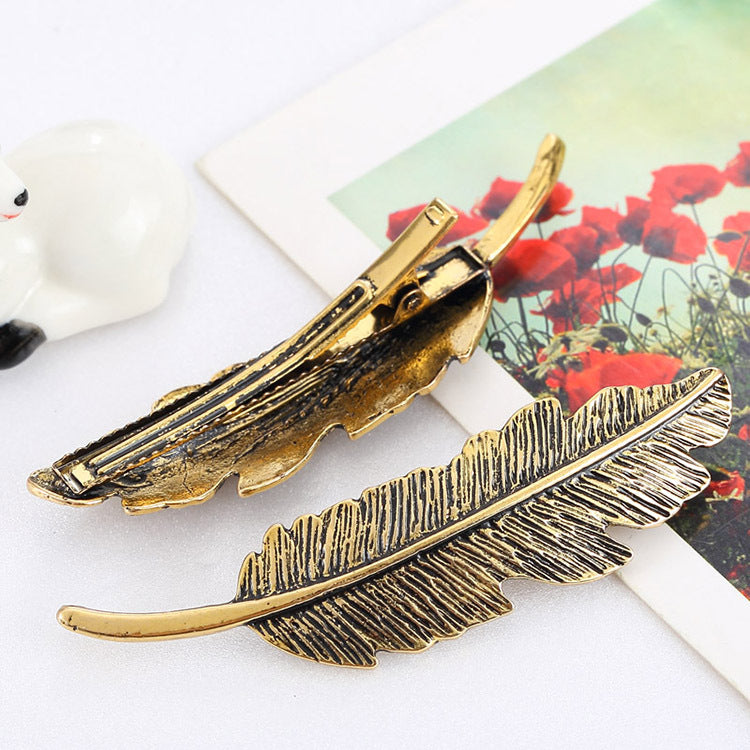 Europe and the United States big leaves feather hairpin fashion lady personality design leaf feather hairpin