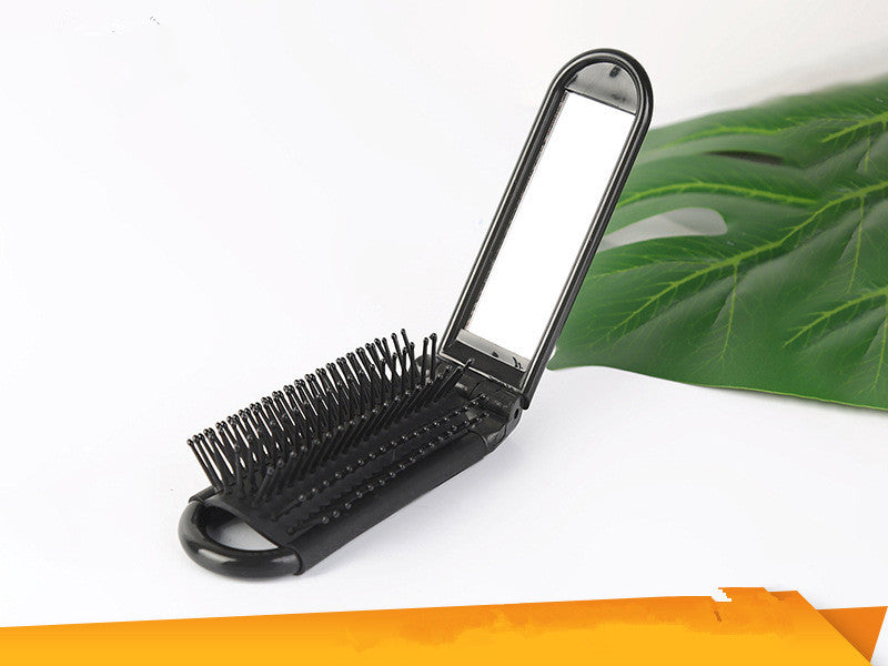 Portable folding comb with mirror