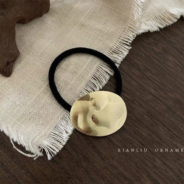 High stretch metal brushed hair rope