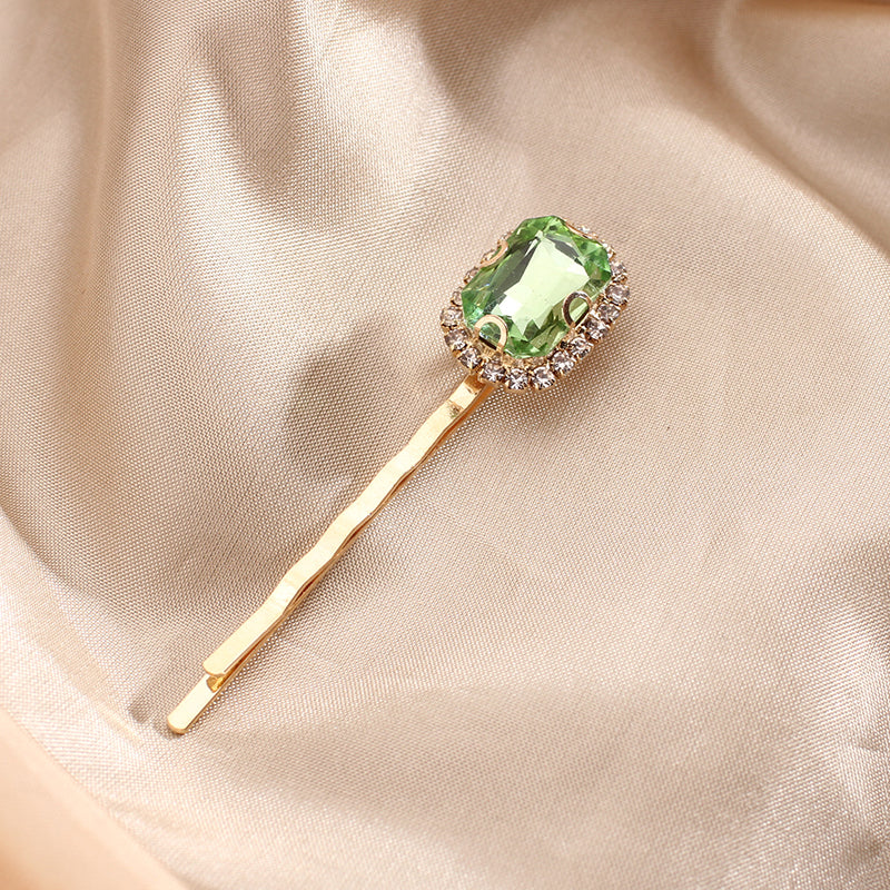 Green zircon hairpin light
