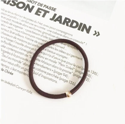 Elastic rubber band with beads