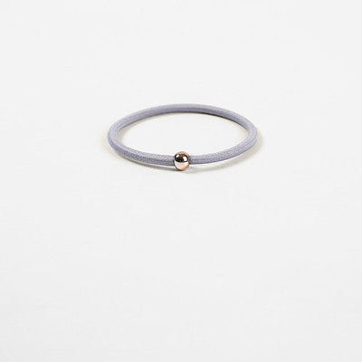 Elastic rubber band with beads