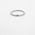 Elastic rubber band with beads