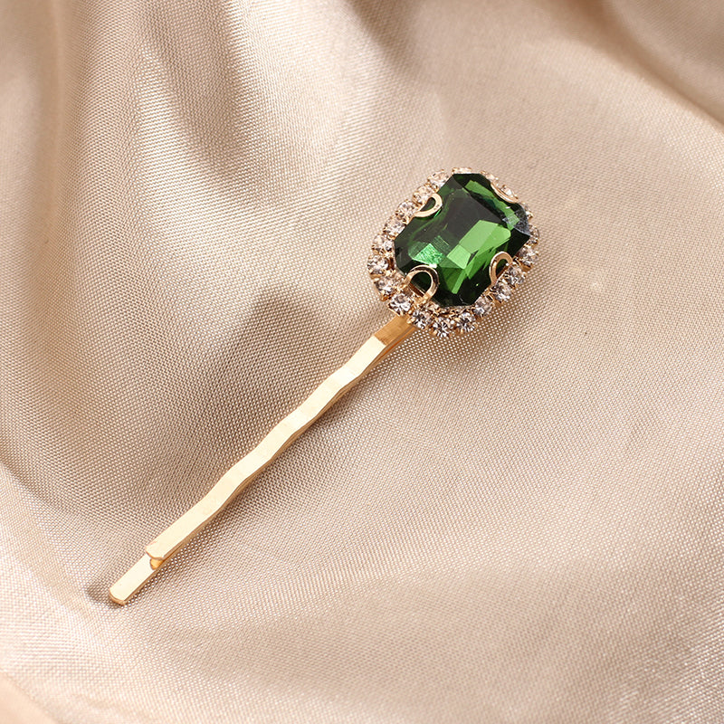 Green zircon hairpin light