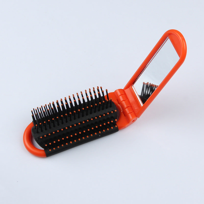Portable folding comb with mirror