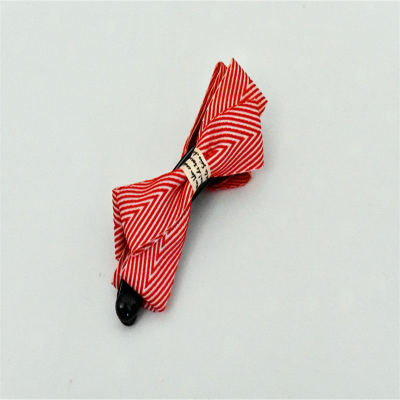 Twisted clip with herringbone bow