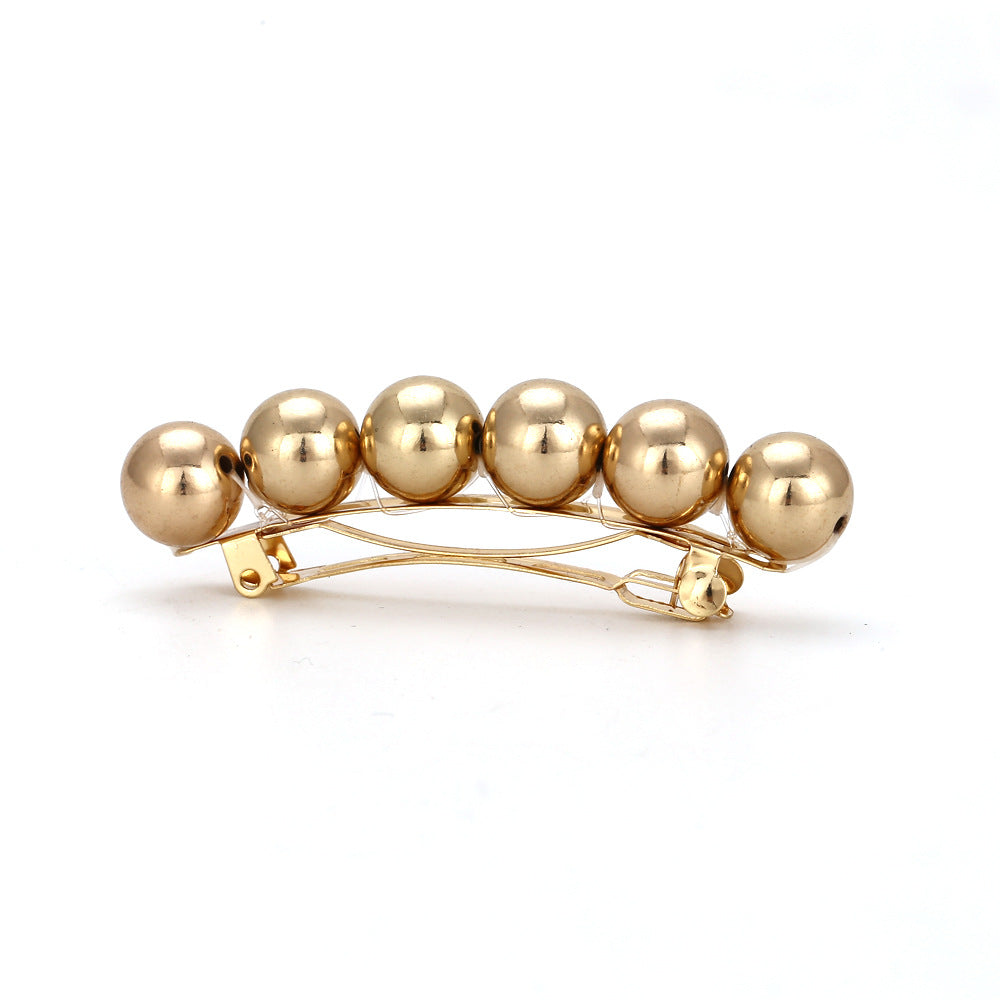 Geometric ball hairpin