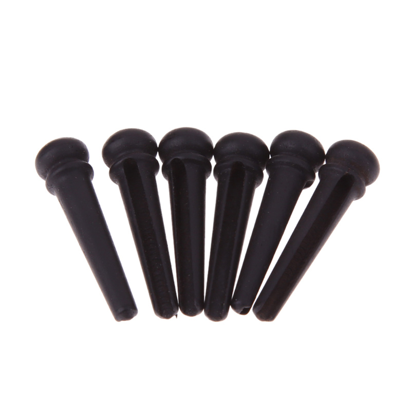 Guitar string nail pressing string post