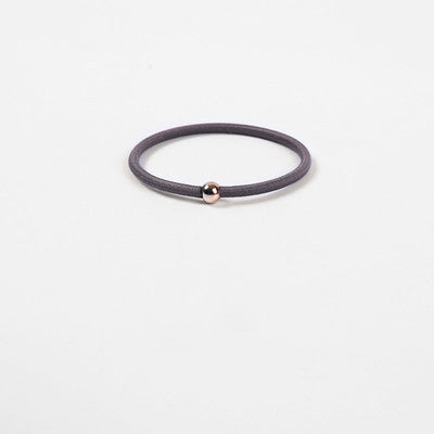 Elastic rubber band with beads