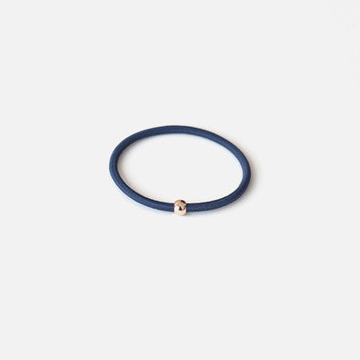 Elastic rubber band with beads