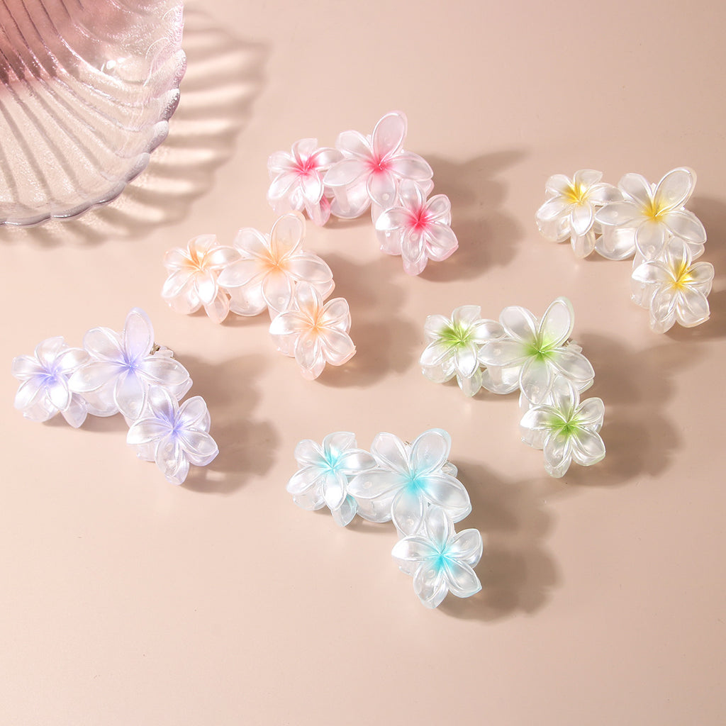 Pearlescent Plumeria Rubra Barrettes Updo