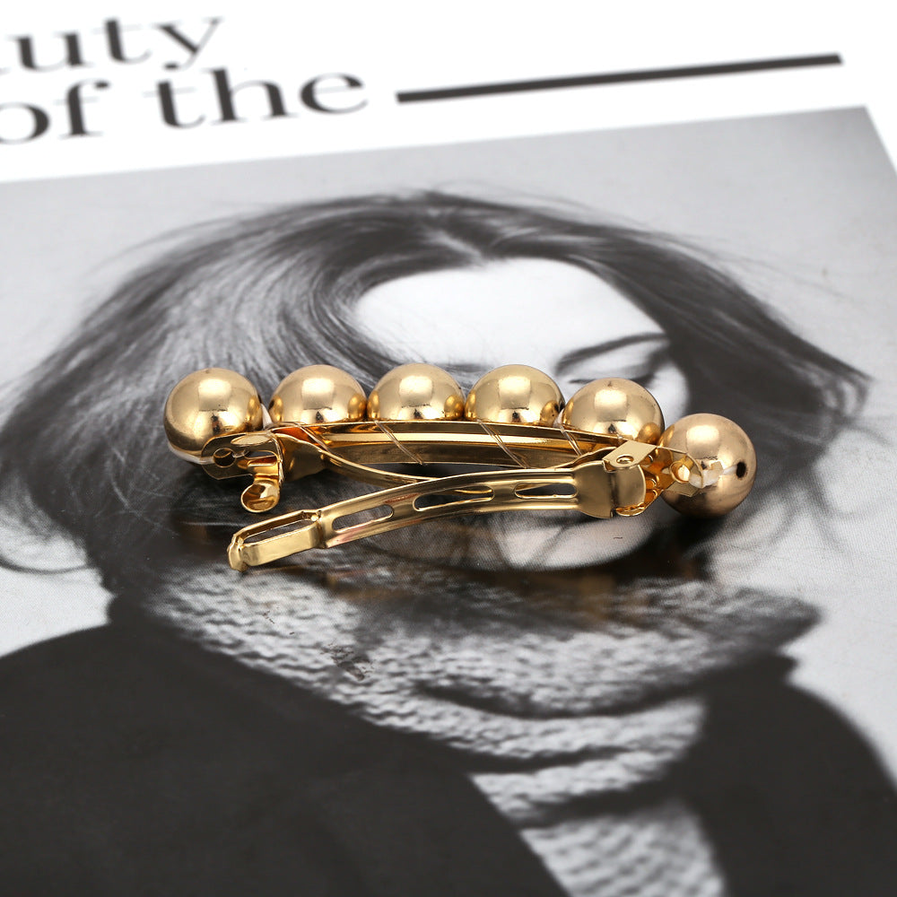 Geometric ball hairpin