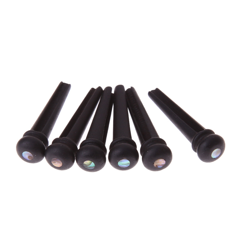 Guitar string nail pressing string post