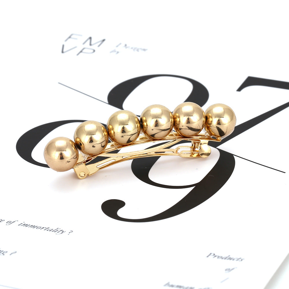 Geometric ball hairpin