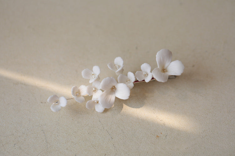 Small And Delicate Ceramic Flower Hairpin