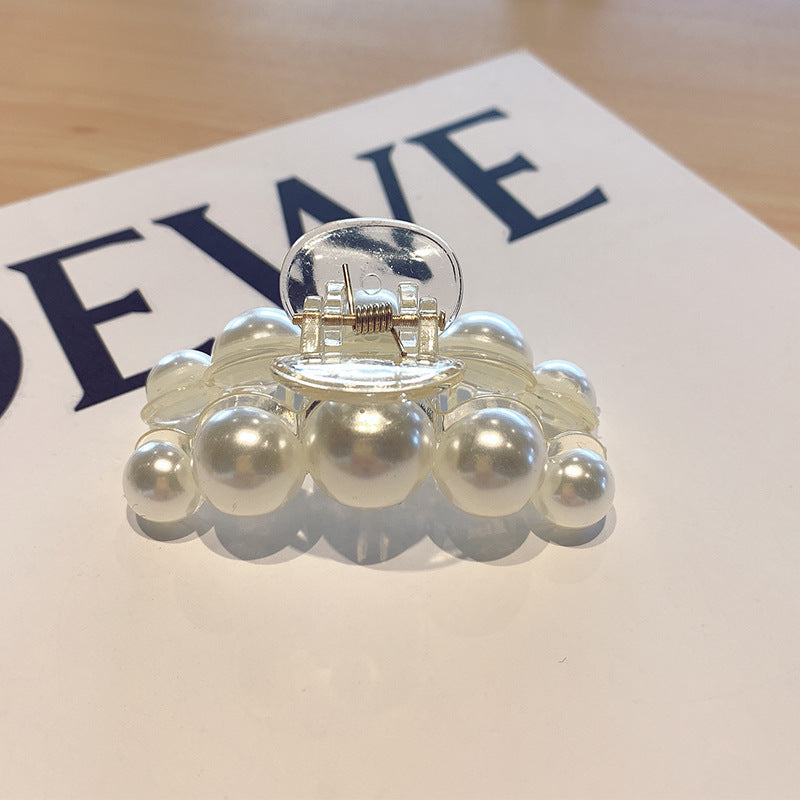 Head ornament with a clip on the back of the head