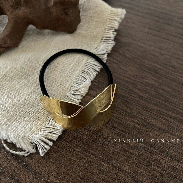 High stretch metal brushed hair rope