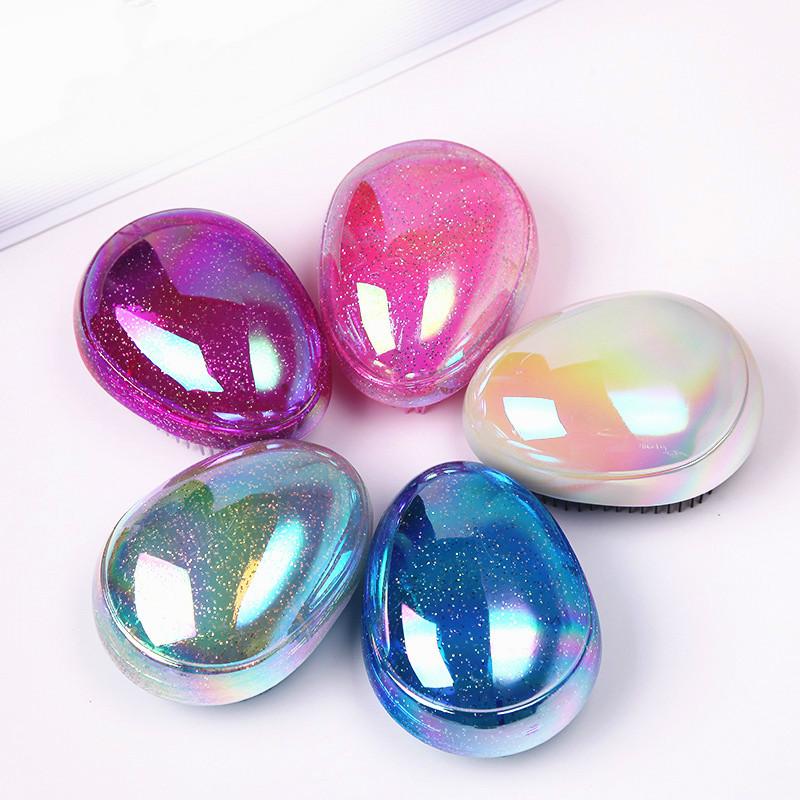 Egg-shaped plastic comb
