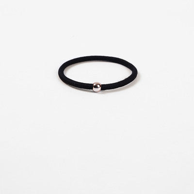 Elastic rubber band with beads