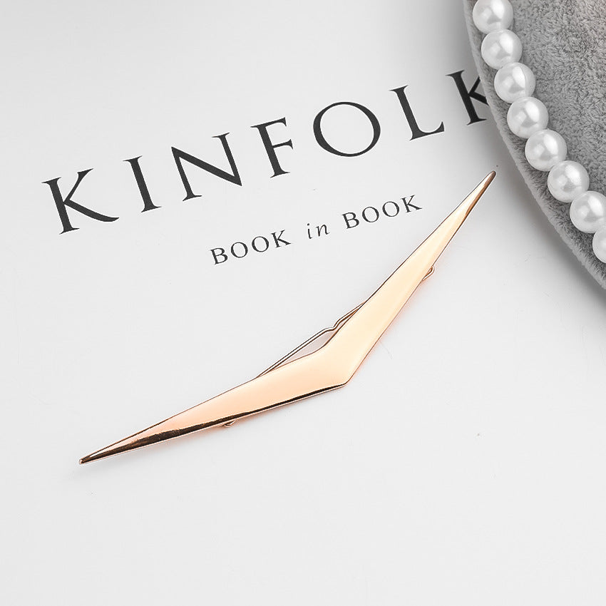Geometric alloy clip
