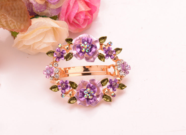 Fashionable hollow clip with colored diamond