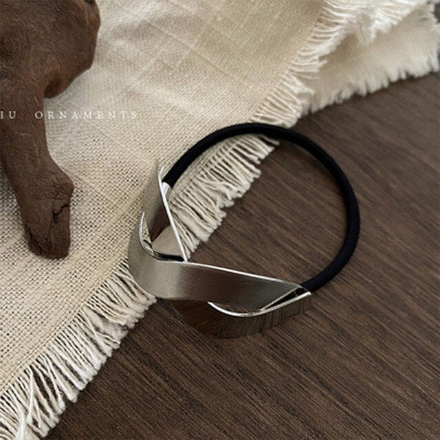 High stretch metal brushed hair rope