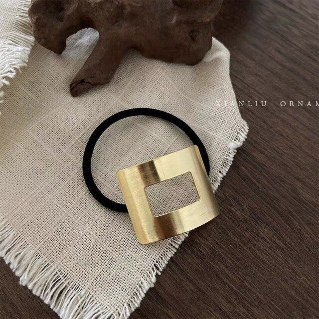 High stretch metal brushed hair rope