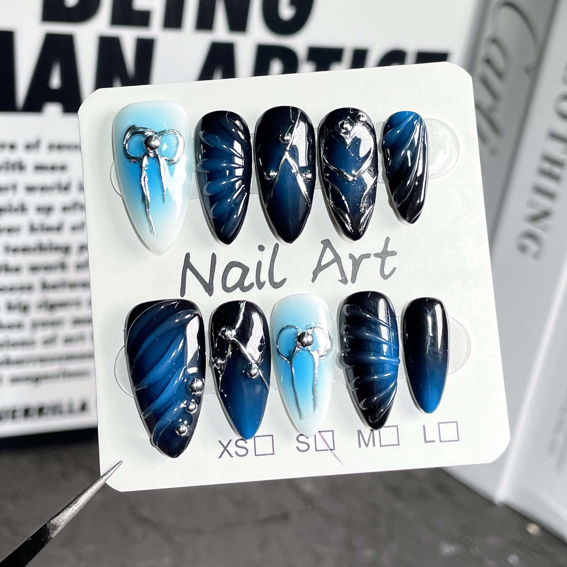 Sweet Edgy And Sassy Hand-painted Embossed Blush Nails For A Bold Eye-catching Look