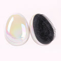 Egg-shaped plastic comb