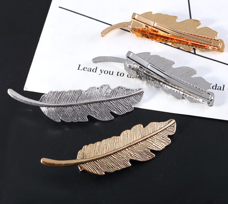 Europe and the United States big leaves feather hairpin fashion lady personality design leaf feather hairpin