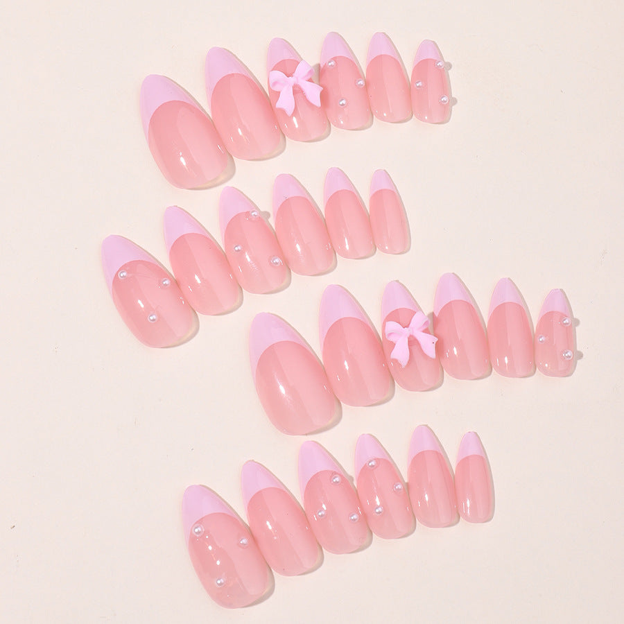 Nail Shaped Piece With Pearl Bow Patch