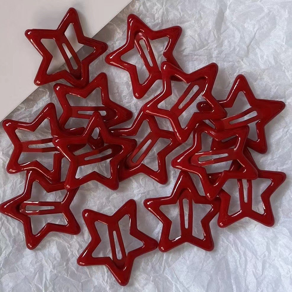 Bangs With Wispy Strands Sidemounted Red Starshaped Drop Hair Clip
