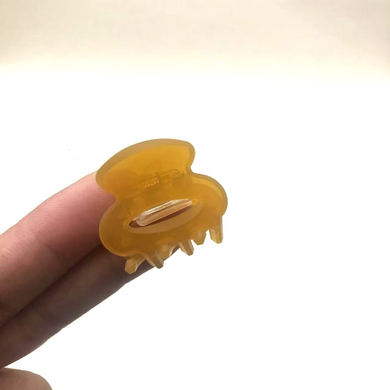 Fashionable Mini Solid-Color Hair Clip With An Elliptical Hollow Design