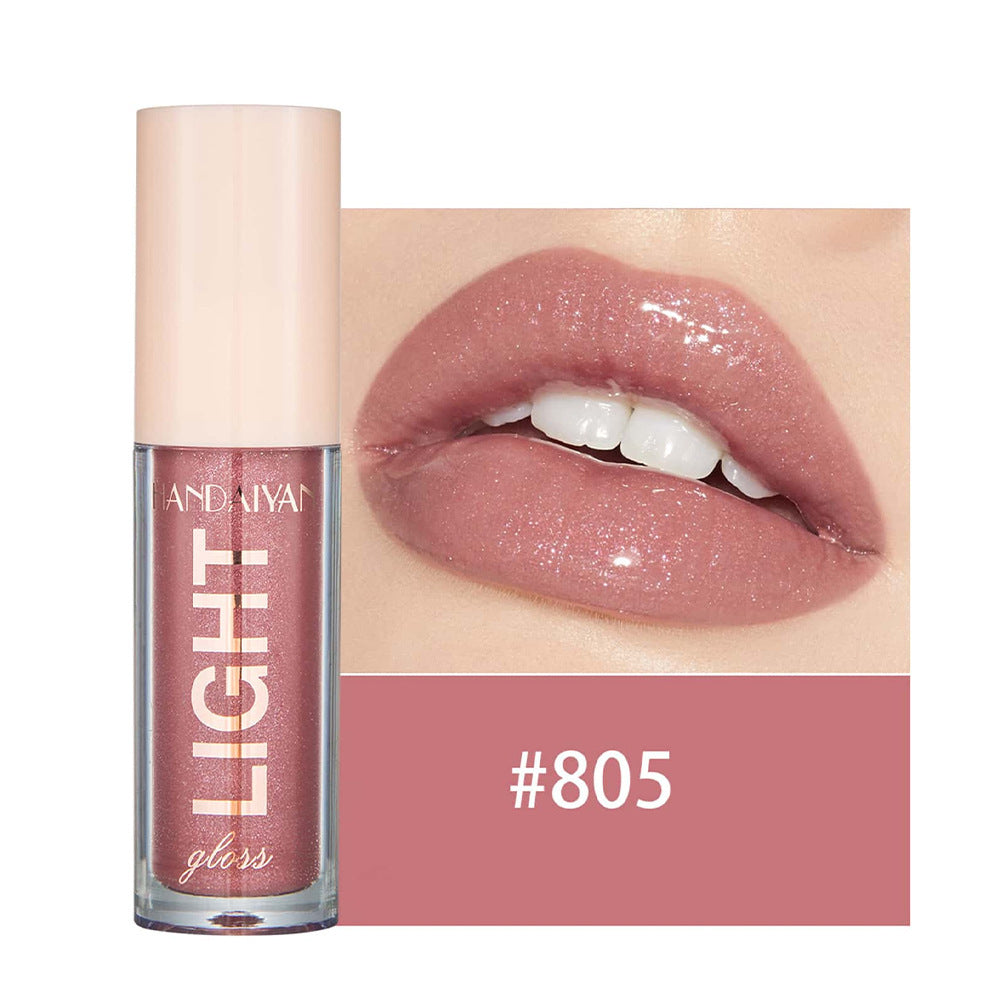 Mirror-like Dewy Liquid With A Pearly Sheen For The Lips