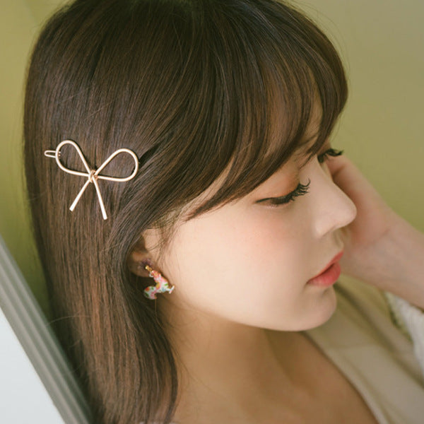 Hollow Geometric Butterfly Combined With Blond Hair Ornaments