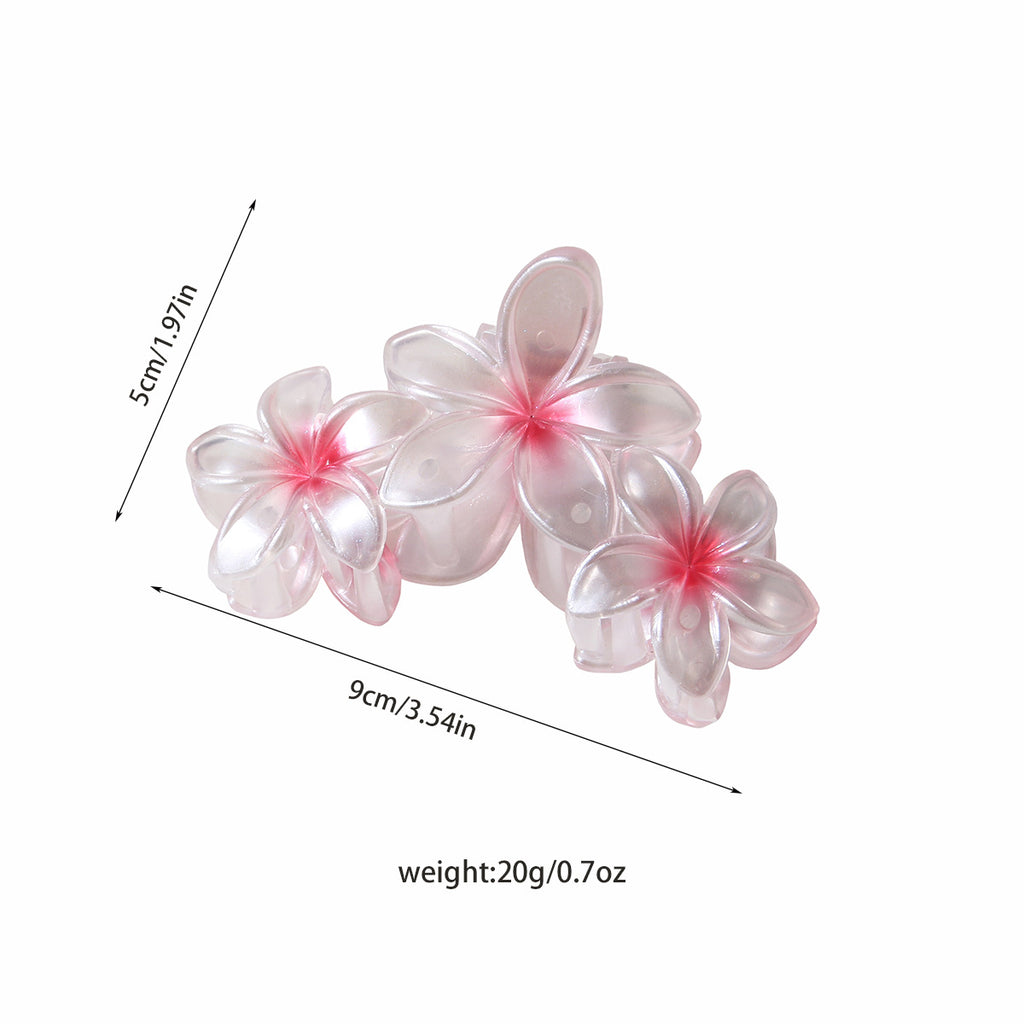Pearlescent Plumeria Rubra Barrettes Updo